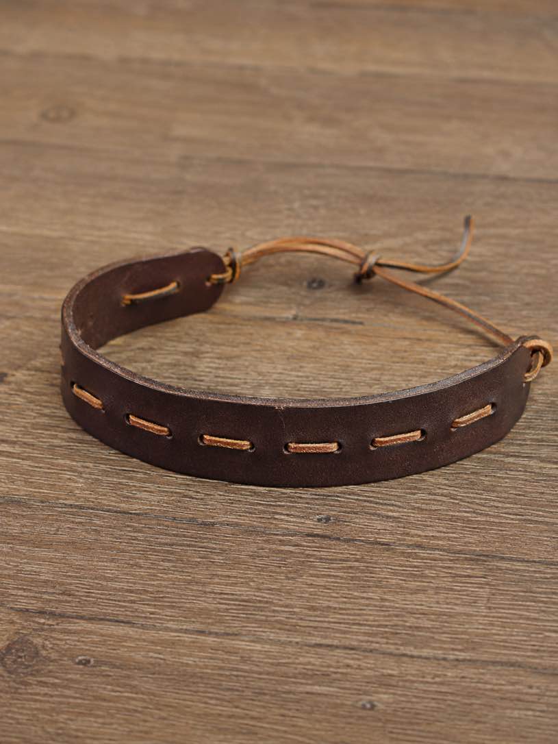 (case of 50) distressed brown leather, hand-laced detailing, and adjustable fit, this bracelet adds the perfect touch of rugged Western charm to any outfit. PM